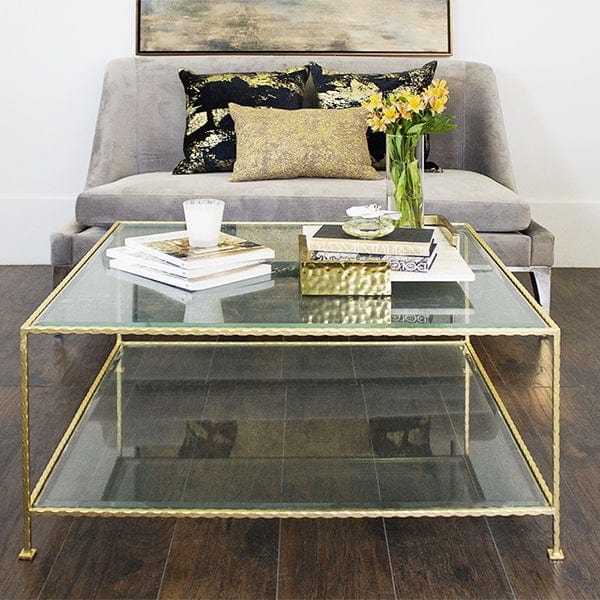 Square gold and store glass coffee table